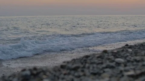 Beautiful pebble beach with large waves and foam. Stock Footage 80213907