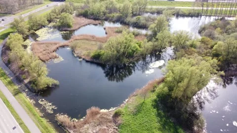 Beautiful piece of nature located between roads. Stock Footage 153124567
