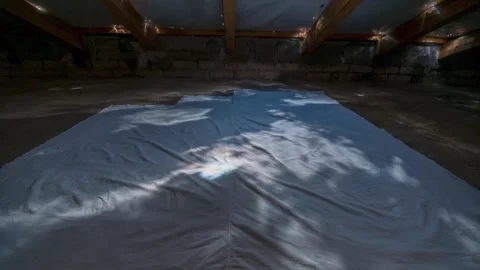 Beautiful pinhole cloud timelapse captured inside a dark attic Stock Footage 304203844