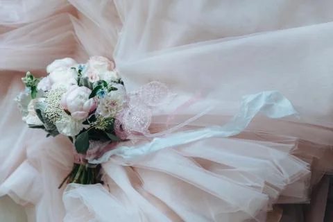 Beautiful pink and white peonies and carnation wedding bouquet. Delicate wedding Stock Photos