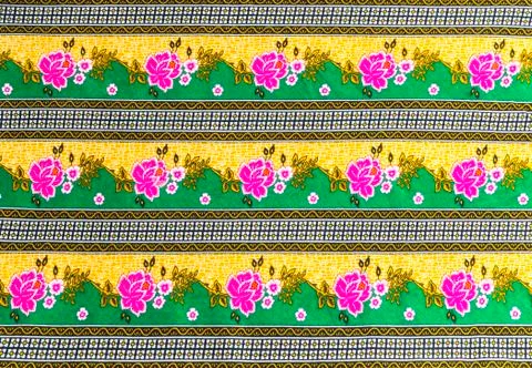 Beautiful pink flower pattern on batik Stock Photos