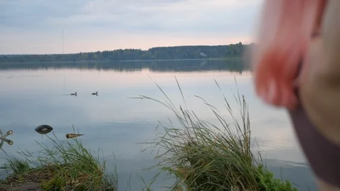 Beautiful pink haired model posing in swimsuit at sunset. Stock Footage 100605957