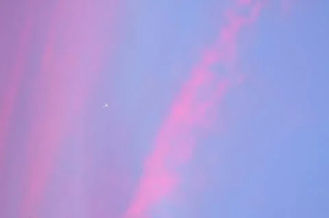 Beautiful pink sky. Cloud background with a pastel colour. Sky with clouds Fotos Stock