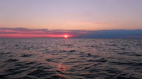 Beautiful pink sunset in the ocean Stock Footage 137996288