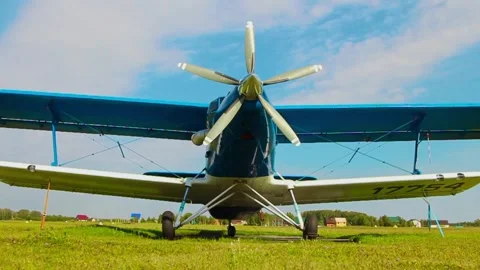 A beautiful plane stands on the airfield in summer 스톡 동영상 281941053