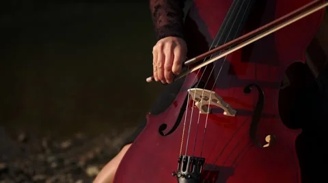 Beautiful playing the cello Stock Footage 55320696
