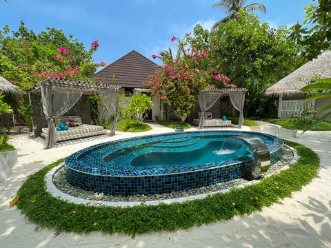 Beautiful pool and comfortable settings at the Heylhi Spa Stock Photos