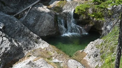 A beautiful pool of a mountain stream with waterfalls (slow motion) Stock-Footage 219644164