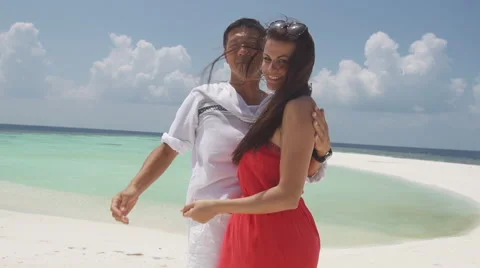 Beautiful Portrait Shot Of Multicultural Couple In Love On Romantic Island Stock Footage 45590804