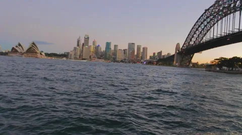 A beautiful post sunset view of the sydney harbour bridge,cbd, and opera house Stock-Footage 36685787