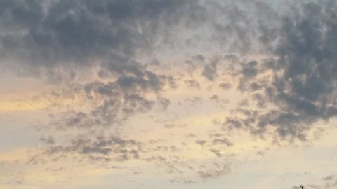 A beautiful pre-sunset sky with light cumulus clouds Stock Footage 337838494