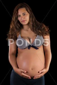 Beautiful pregnant girl in the studio Stock Photos