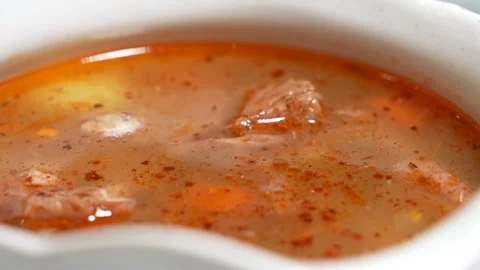 Beautiful presentation of the fish soup in a white plate Video stock 300759714