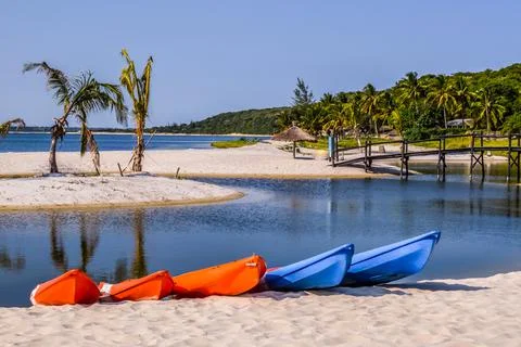 Beautiful ,pristine and Turquoise Maputo beach at Bilene with a lagoon and In Stock Photos