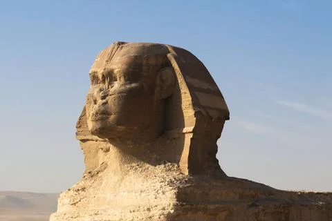 Beautiful profile of the Sphinx pyramid on sunrise. Stock Photos