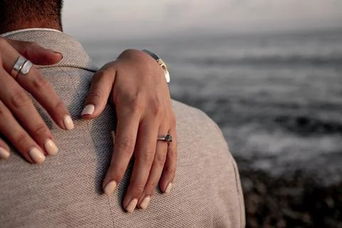 Beautiful proposal ring on one hand Stock Photos