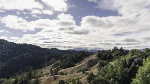 Beautiful Puffy White Clouds Blue Sky Hills Forest Timelapse Stock Footage 203366596
