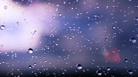 Beautiful rain drops fall in slow motion. Loop Video stock 709875