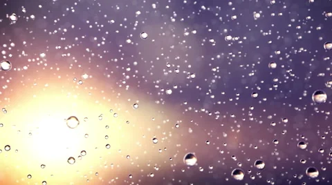 Beautiful rain drops fall in slow motion. Loopable Stock Footage 45663434