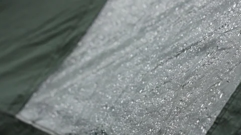 Beautiful rain drops on tent Stock Footage 113284191