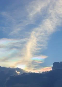 Beautiful rainbow clouds on the sky. Stock Photos