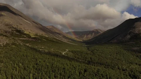 Beautiful rainbow in the mountains Stock Footage 221944547