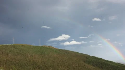 Beautiful rainbow in the mountains Stock Footage 254568272
