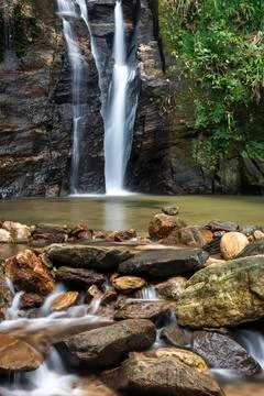 Beautiful rainforest waterfall landscape in Tijuca Forest jungle Stock Photos