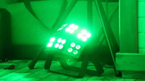 Beautiful rays from spotlights on stage Stock Footage 128567708