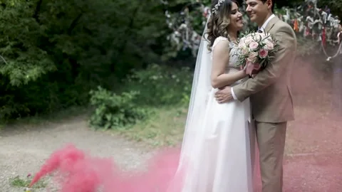 Beautiful red colored smoke at the wedding. 스톡 동영상 132410288
