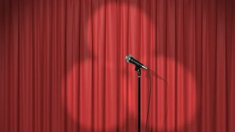 Beautiful Red Curtain with Spotlights and a Microphone on Stage Stock Footage 103581253