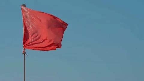 Beautiful red flag blowing in the wind, close-up Video stock 225309792