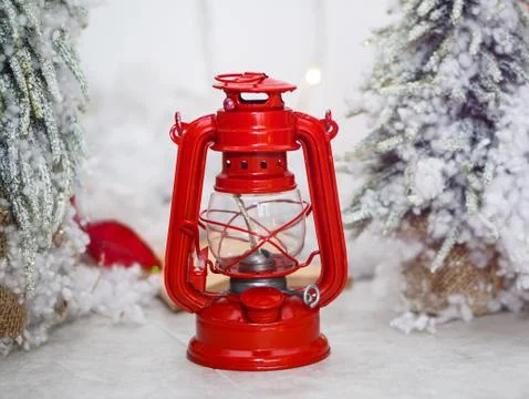 Beautiful red lantern winter composition in white snow. Christmas and New Yea Stock Photos