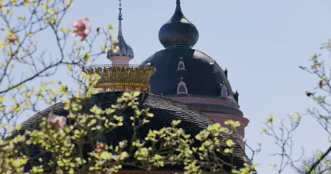 Beautiful Red Mosque in Germany during Spring With Cherry Blossom Stock Footage 183930575