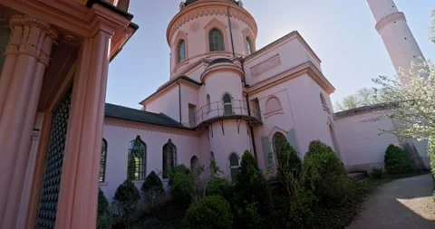 Beautiful Red Mosque in Germany during Spring With Cherry Blossom Stock Footage 183931564