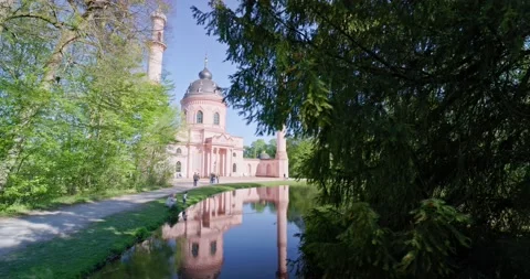 Beautiful Red Mosque in Germany during Spring With Cherry Blossom Stock Footage 183932419