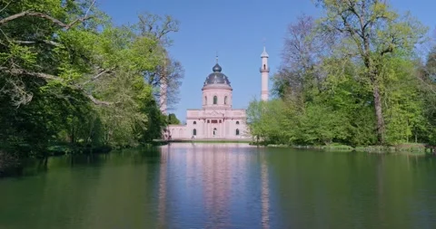 Beautiful Red Mosque in Germany during Spring With Cherry Blossom Stock Footage 183932462