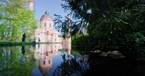 Beautiful Red Mosque in Germany during Spring With Cherry Blossom Stock Footage 183932490