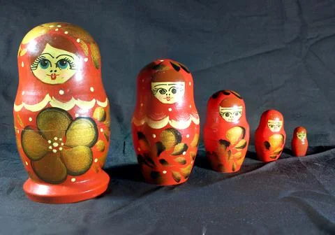 Beautiful red nesting dolls Stock Photos