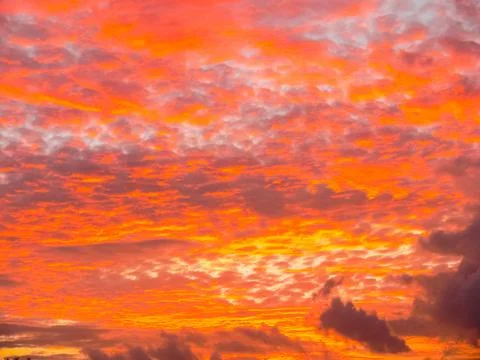 Beautiful red sunset with clouds. Stock Photos