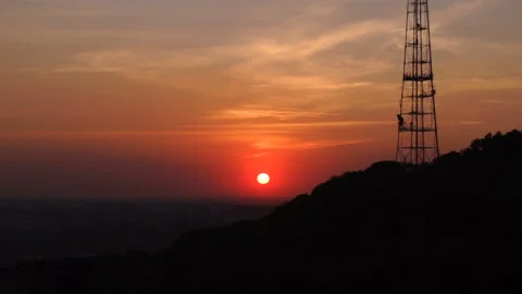 Beautiful red sunset with clouds. TV Tower and Skyline. Charming nature. No Stock Footage 177091858