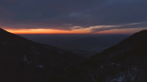Beautiful red sunset sky with clouds in Bulgaria mountains Stock Footage 109623301