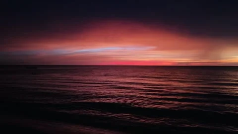 Beautiful red sunset sky over the water, Mayapo, La Guajira, Colombia Stock Footage 266591894