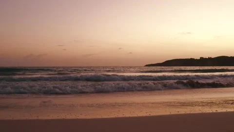 Beautiful red sunset on the wild beach of a tropical island. Stock Footage 138460247