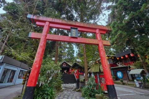 Beautiful red Torii gate in front of Xitou monster village at Xitou Stock Photos