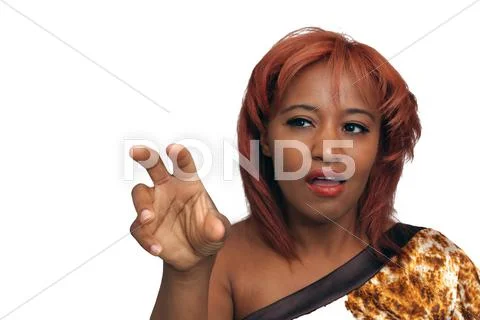 Beautiful redhead makes adjustment Stock Photos