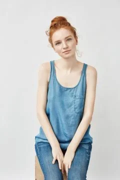 Beautiful redhead model smiling looking at camera Fotos Stock