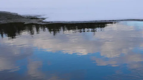 Beautiful Reflecting Landscape Pine Tree Time Lapse Clouds In Open Water By Ice Stock-Footage 162205595