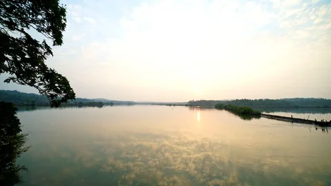 Beautiful reflection of clouds on still lake water on sunny day. 動画素材 106105024