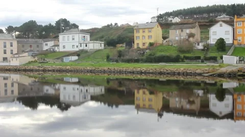 Beautiful reflection of the houses in the river Stock Footage 324681682